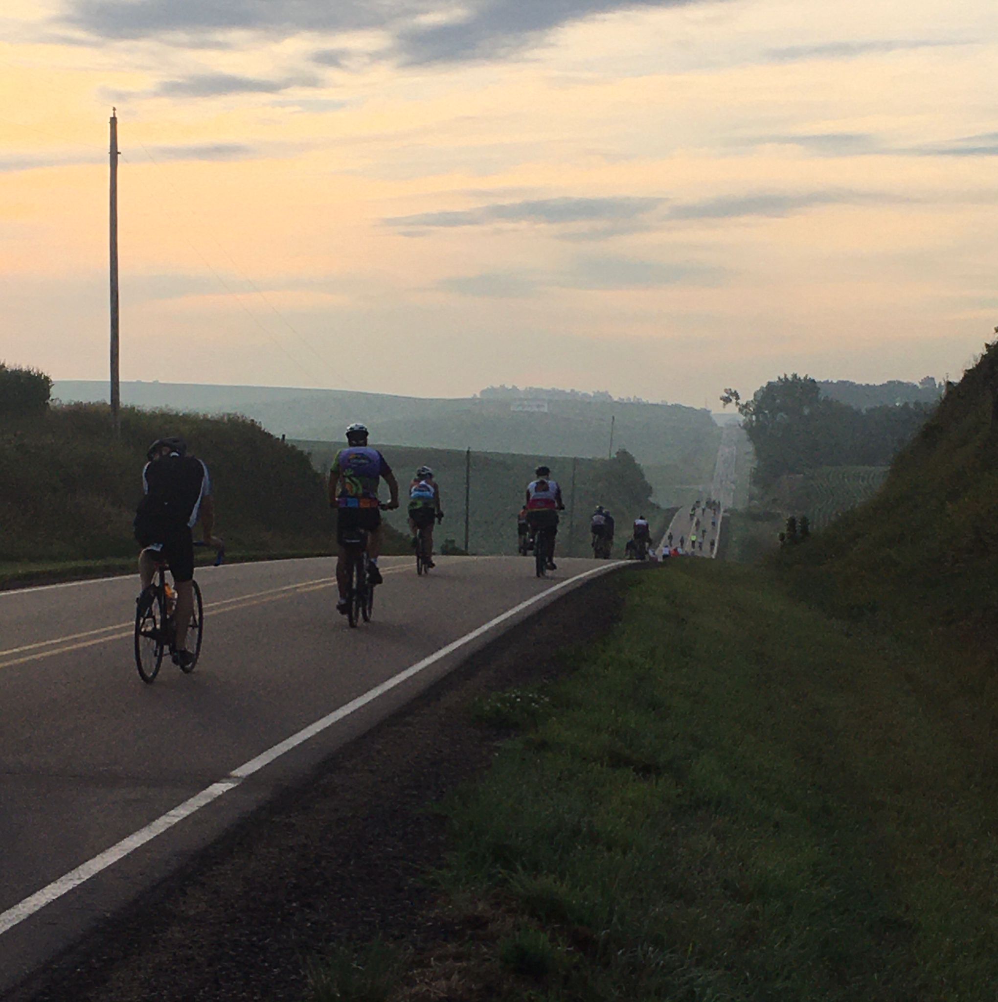 bikers during sunset
